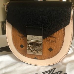 MCM 	
Patricia Shoulder Bag in Color Block Visetos
Black
Mini EUC